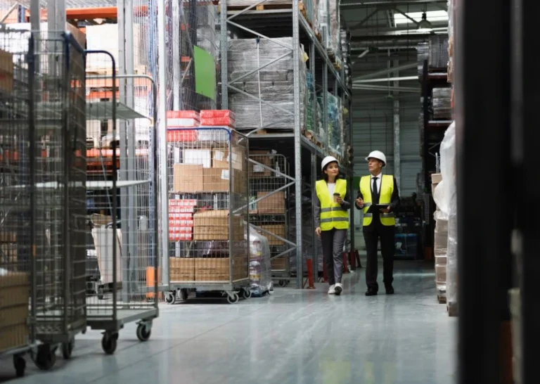 A warehouse worker inspecting goods brought in by a pharmaceutical importer in Malaysia.