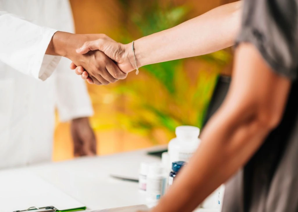 A licensed pharmaceutical importer in Malaysia and a potential client closing a deal.