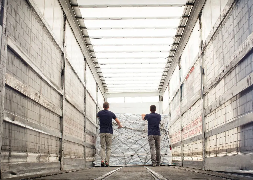 Workers inspecting a warehouse for their cold chain logistics in Malaysia.