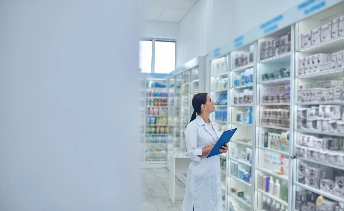 A pharmacist conducting an inventory check.