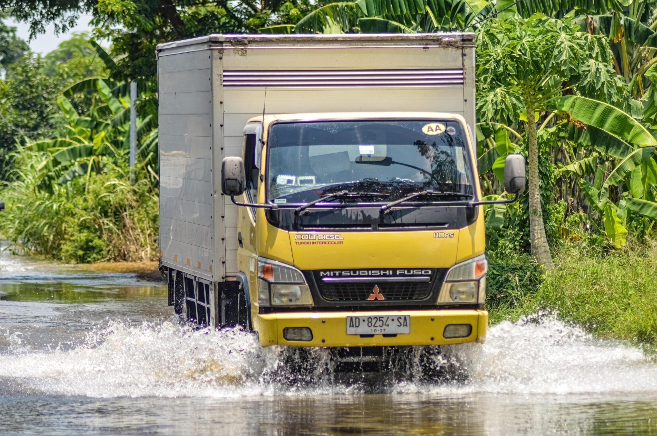 https://octopus-distribution.com.my/wp-content/uploads/2026/03/a-logistics-box-truck-passing-through-flood-waters-in-gresik-district-indonesia-21-february-2024-free-photo-scaled.jpg