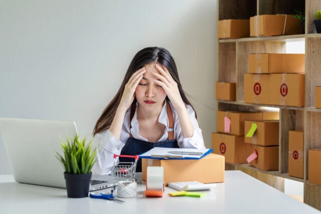 Brand owner reviewing pharmaceutical market entry documents and timelines